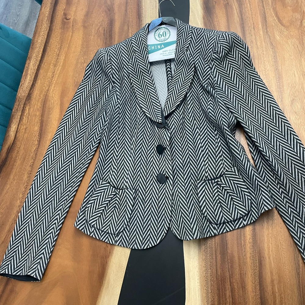 Armani jacket, beautiful and has some stretch so very comfortable. Size 6